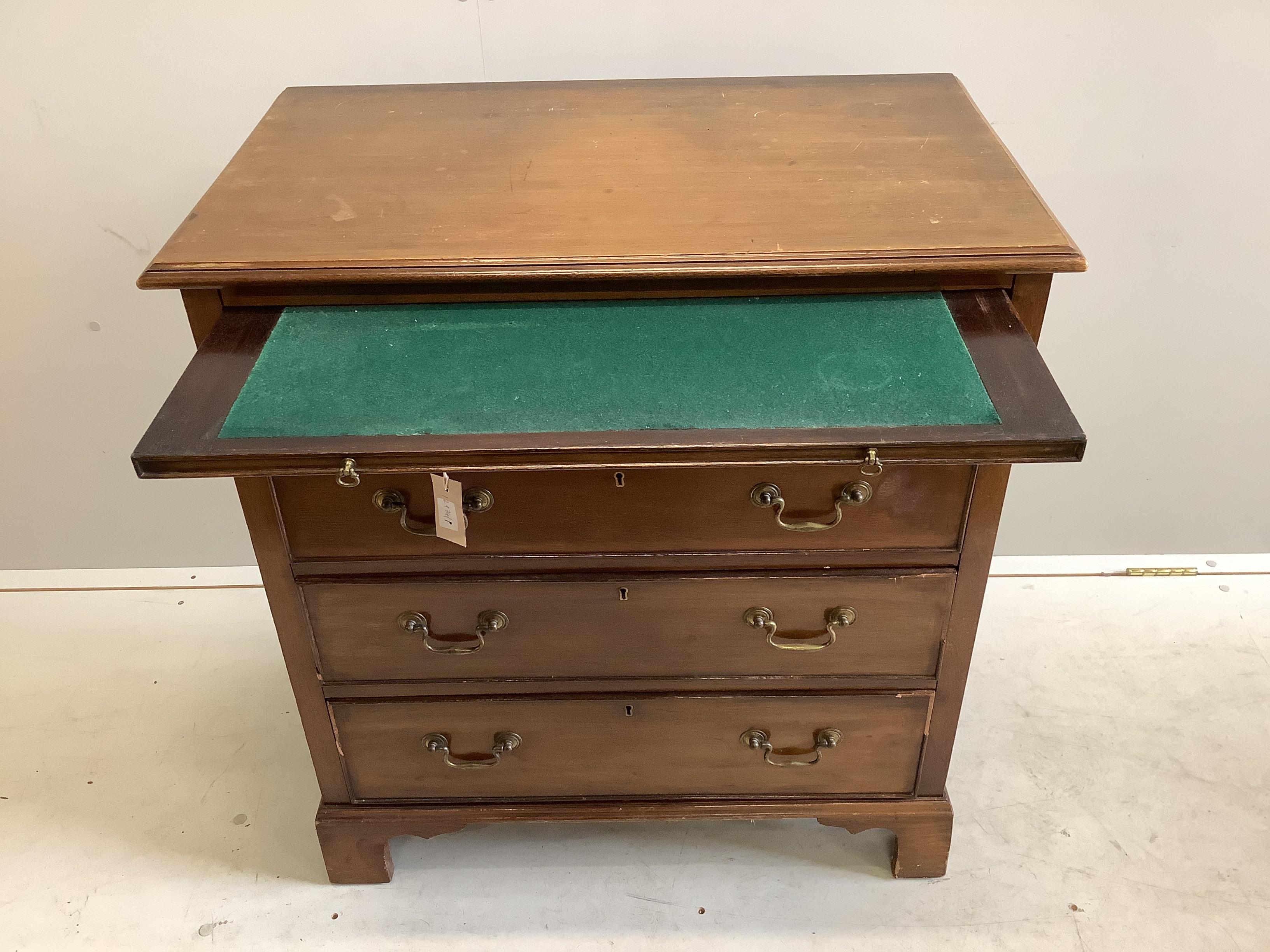A small George III style mahogany chest with slide, width 76cm, depth 45cm, height 83cm